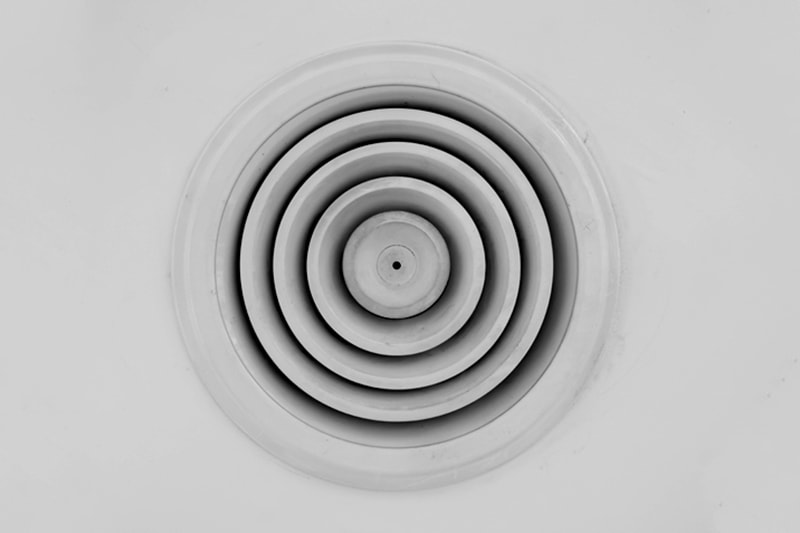 Circular metal air ventilator on white ceiling, Leaky Ducts & You | HVAC Service, Ductwork, Cooling | Saratoga, CA